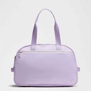 NWT Lululemon City Essentials Duffle Bag 28L
Lavender Frost / Gold